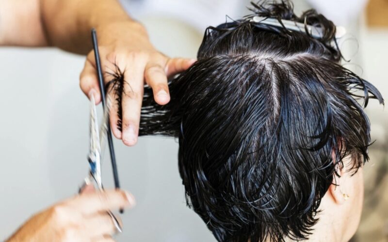 Haircut in progress showing how the starting point of cutting can affect the final hairstyle
